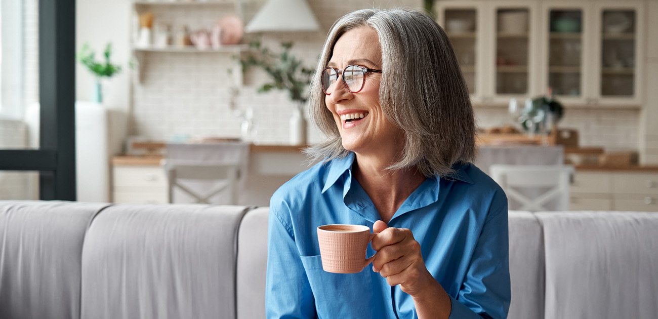 Killeen patient smiling after getting dentures 