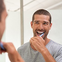 A man brushing his teeth